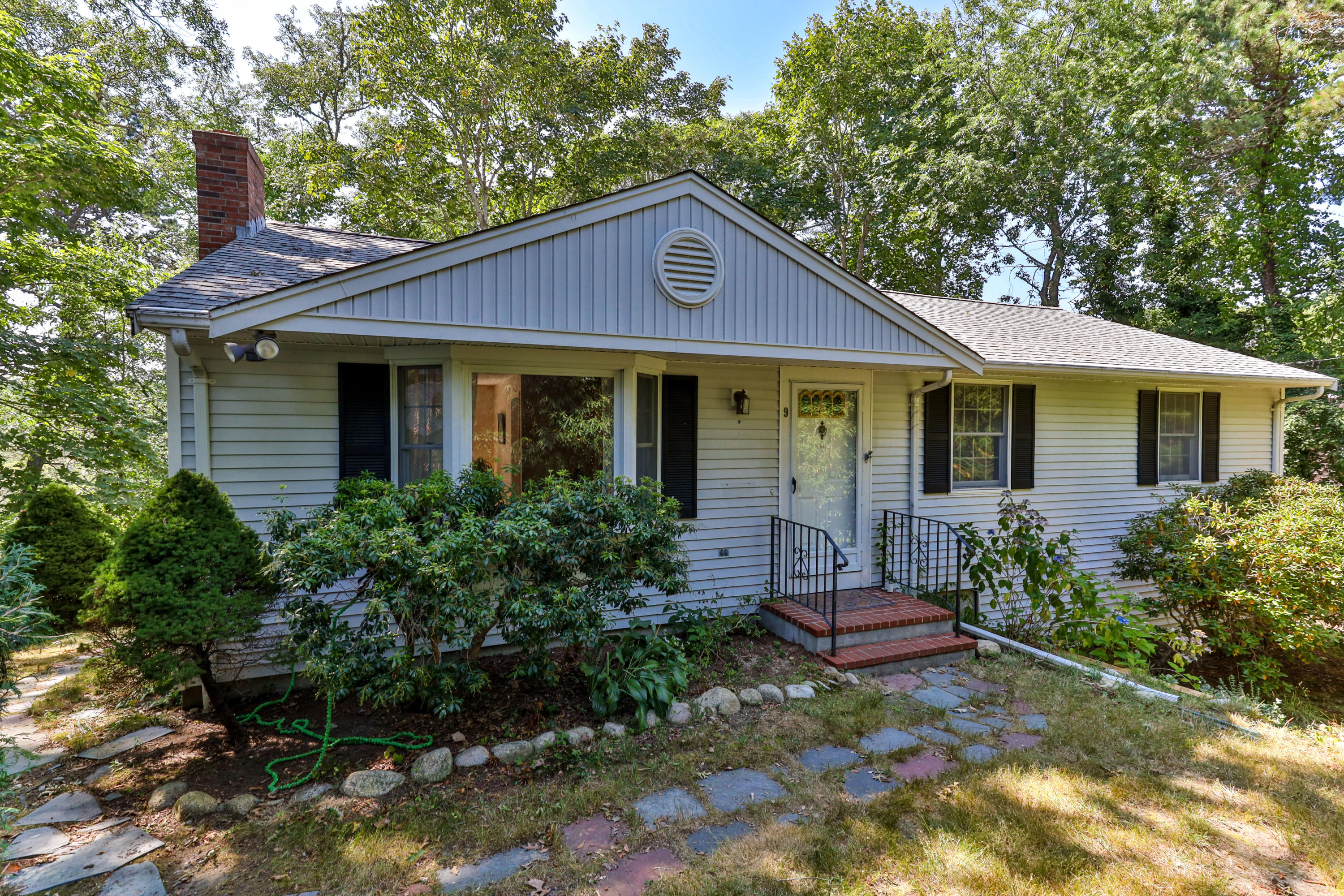 9 Green Pond Road East Falmouth, MA 02536 - Photo 2 of 46 a front view of a house with a yard