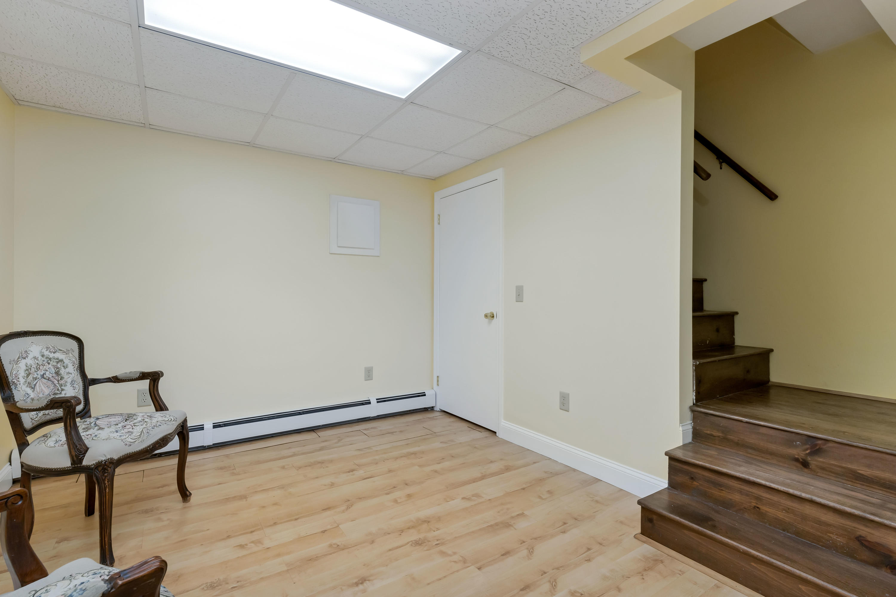 9 Green Pond Road East Falmouth, MA 02536 - Photo 22 of 46 a view of a room with wooden floor and bench