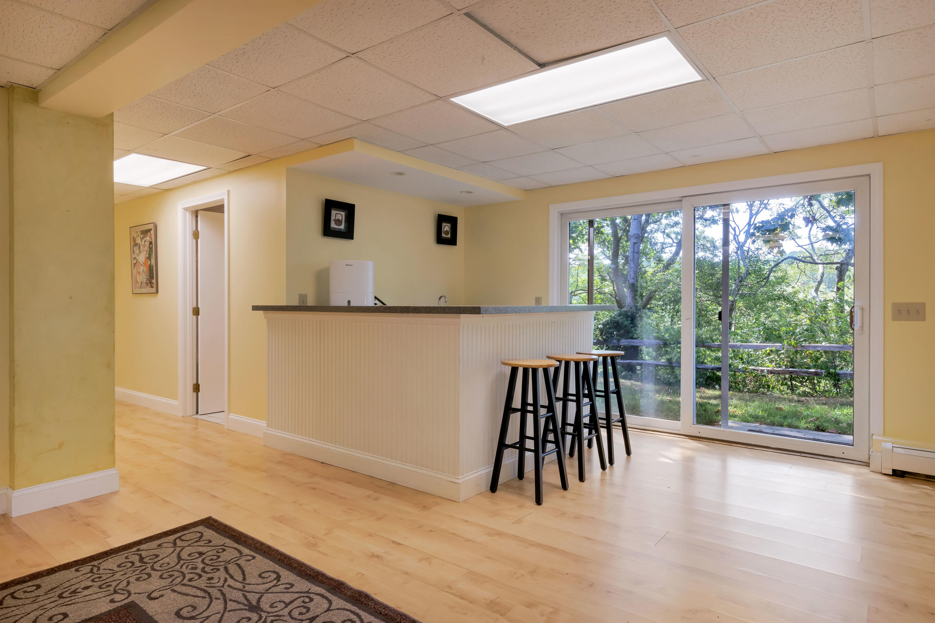 9 Green Pond Road East Falmouth, MA 02536 - Photo 26 of 46 a view of wooden floor and a rug