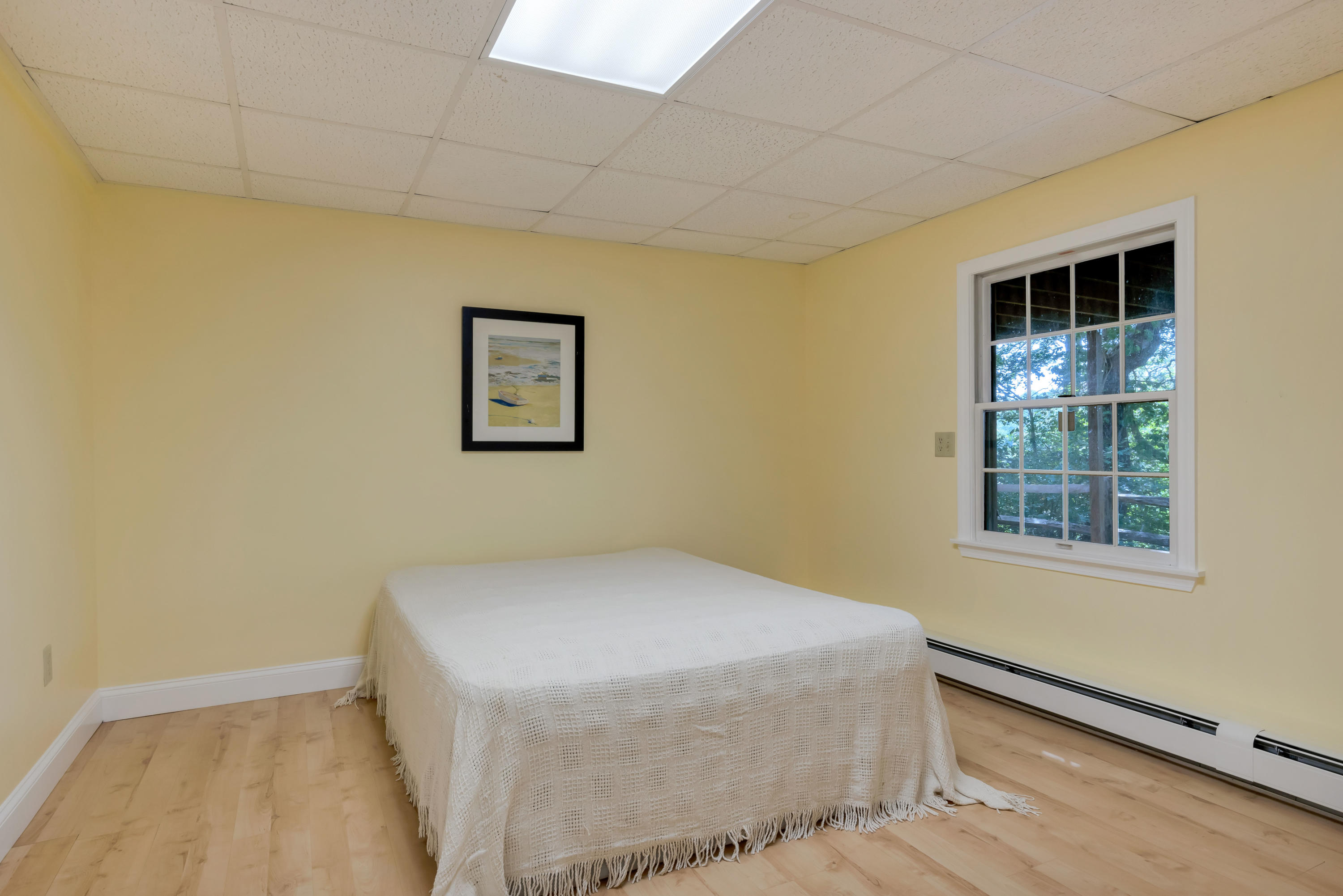 9 Green Pond Road East Falmouth, MA 02536 - Photo 28 of 46 a bedroom with a bed and a window