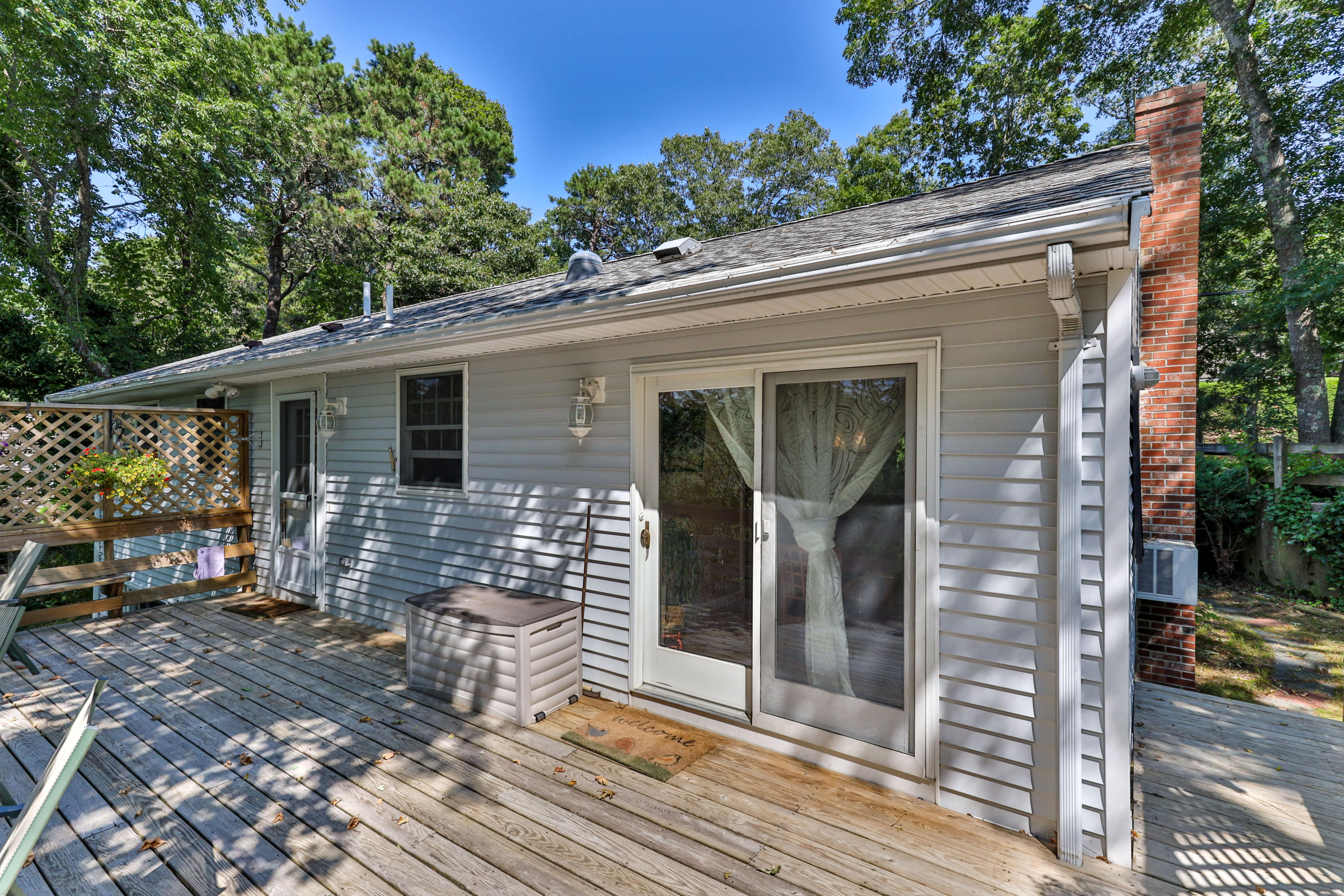 9 Green Pond Road East Falmouth, MA 02536 - Photo 30 of 46 a view of a house with a patio