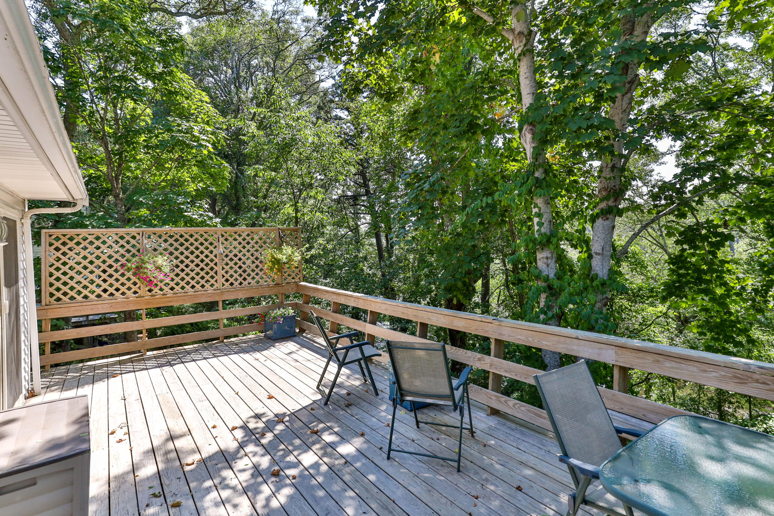 9 Green Pond Road East Falmouth, MA 02536 - Photo 32 of 46 a view of a roof deck with wooden floor and fence