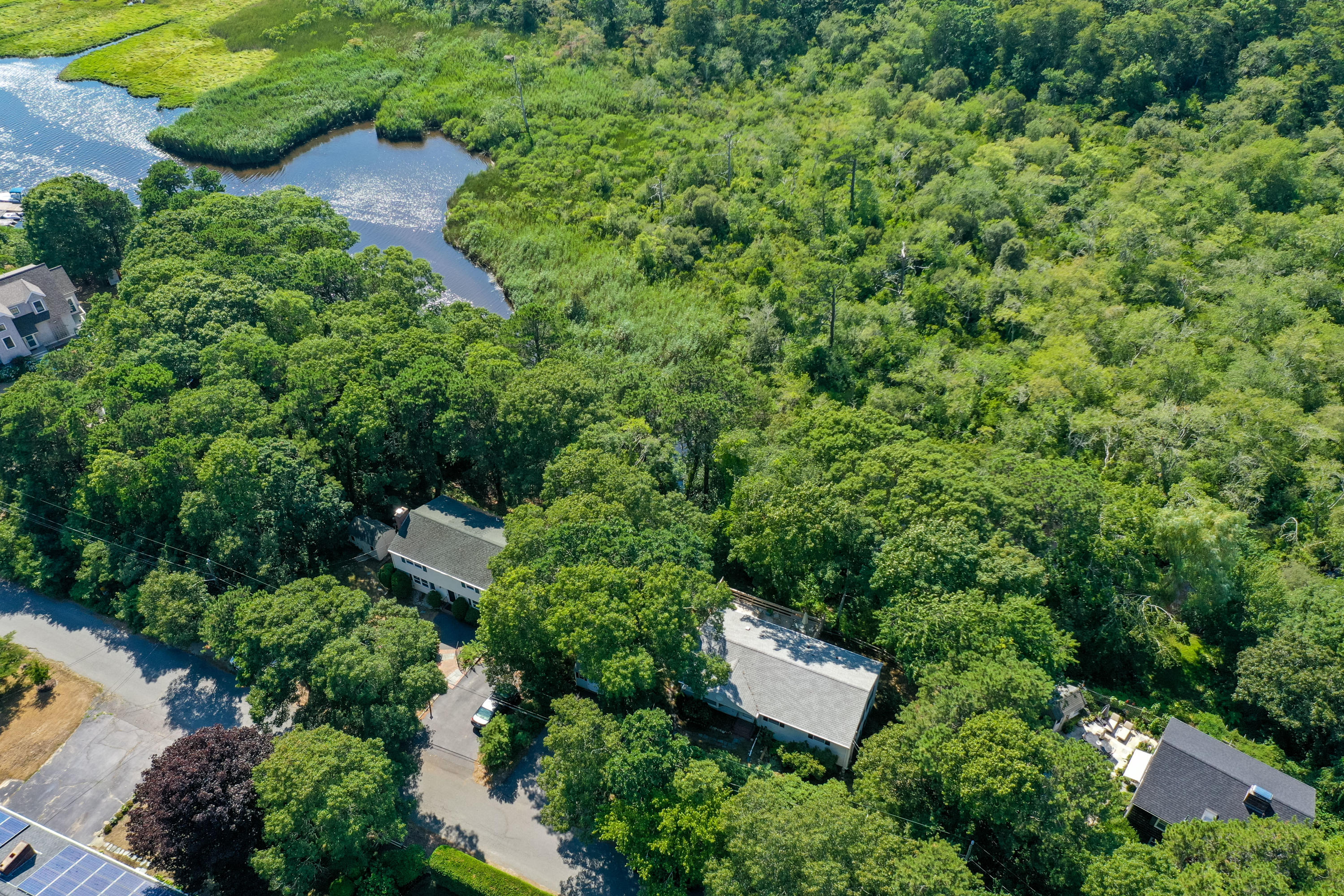 9 Green Pond Road East Falmouth, MA 02536 - Photo 38 of 46 an aerial view of a house with a yard