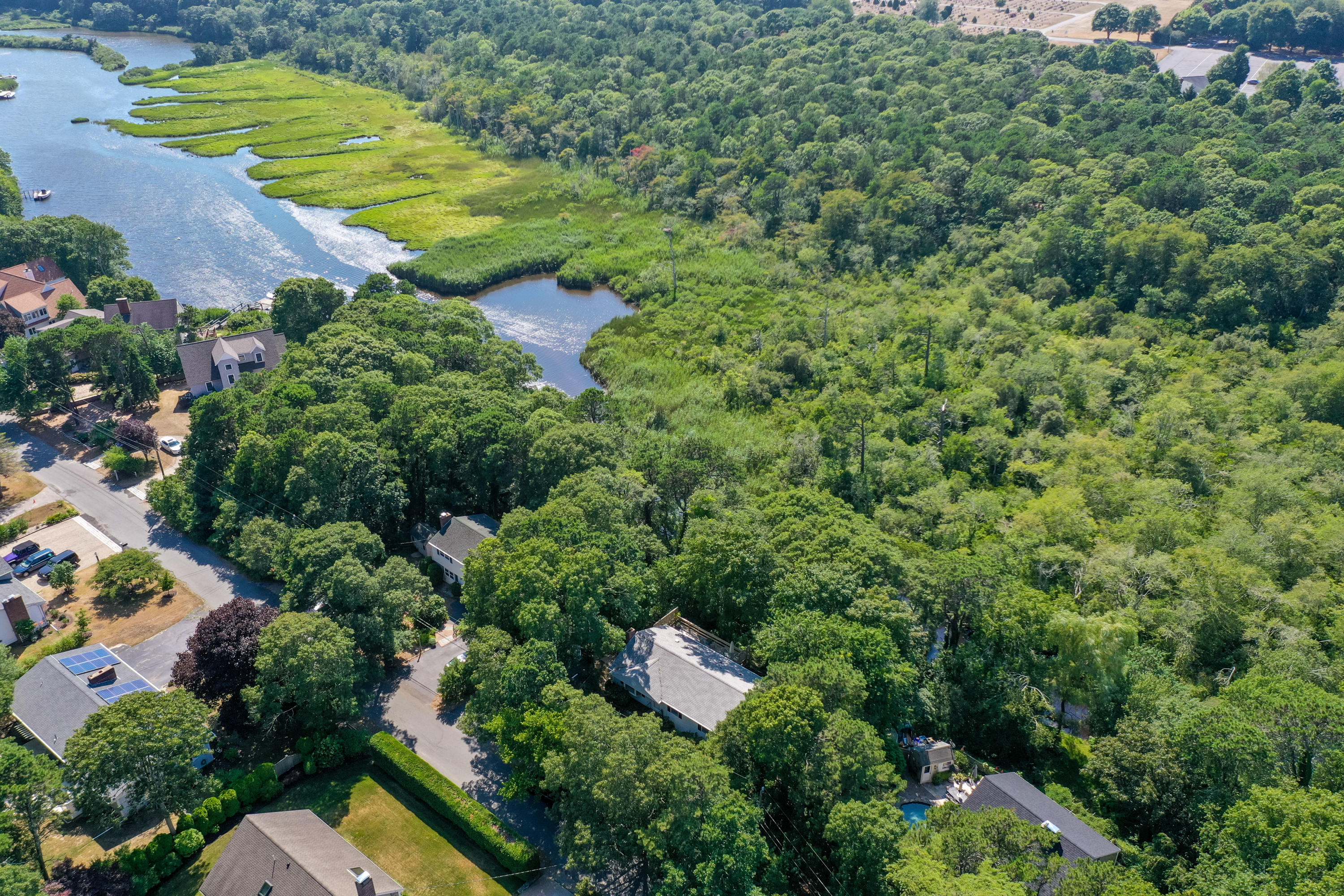9 Green Pond Road East Falmouth, MA 02536 - Photo 39 of 46 an aerial view of residential house with outdoor space and trees all around