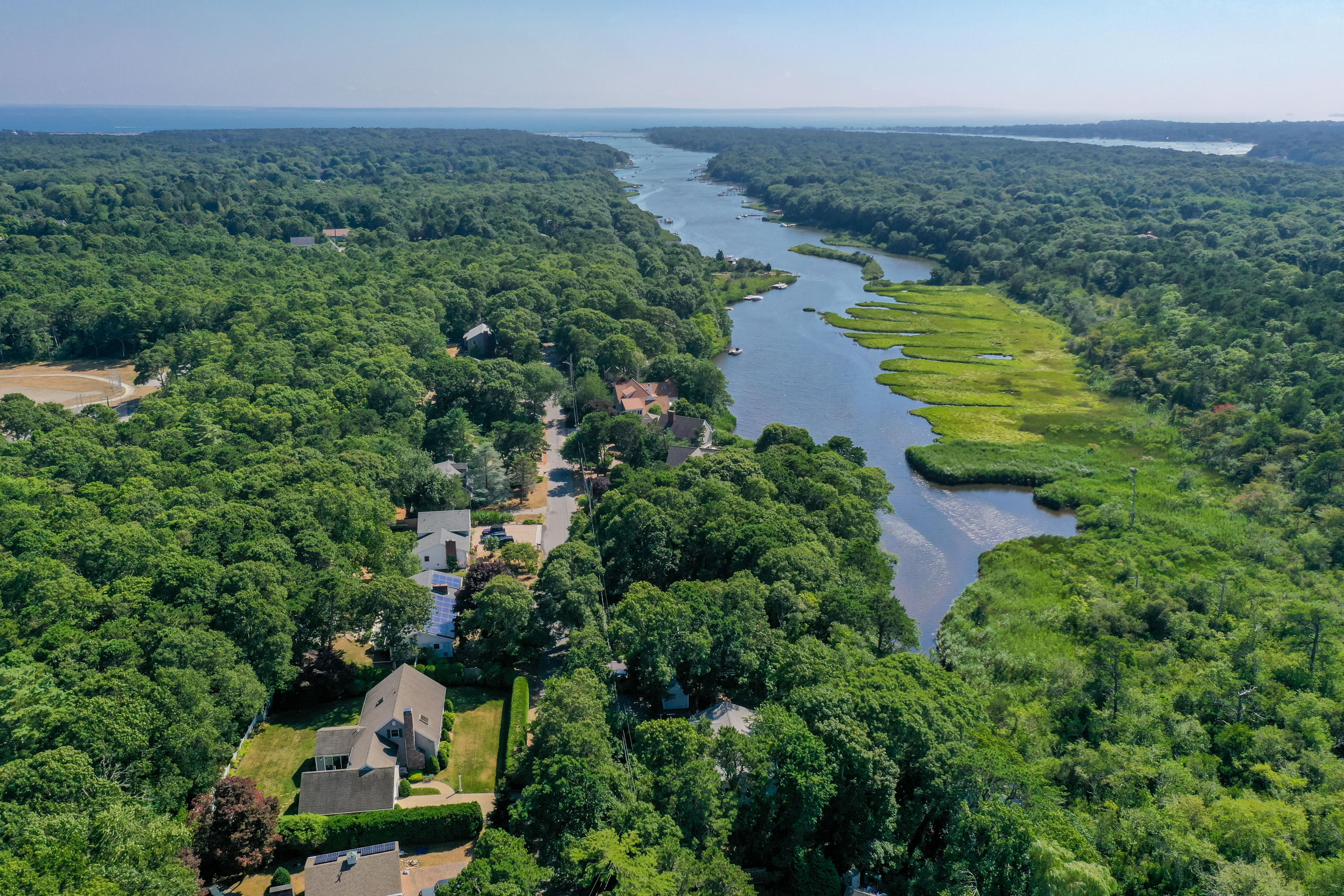9 Green Pond Road East Falmouth, MA 02536 - Photo 41 of 46 an aerial view of a houses with a yard