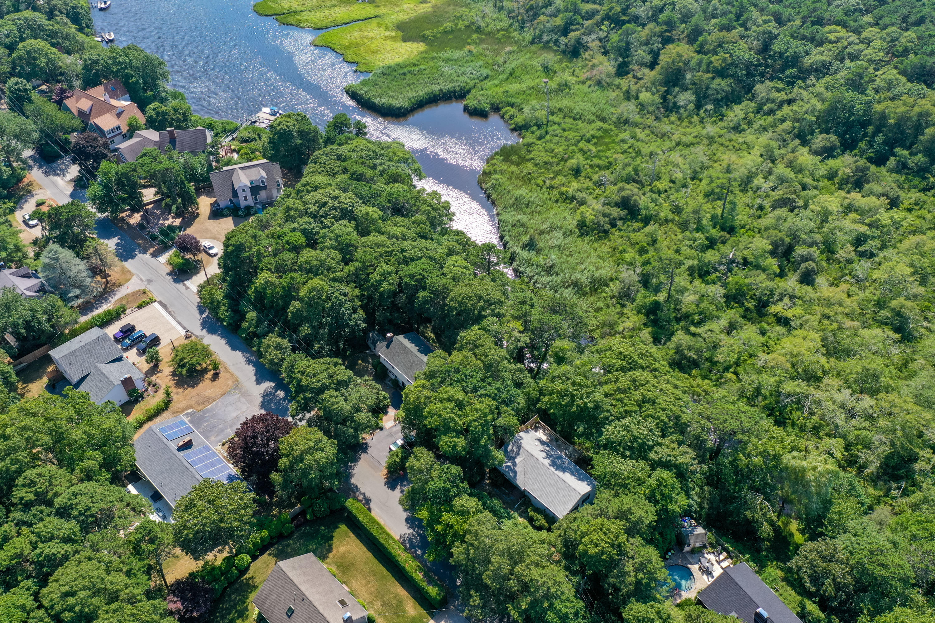 9 Green Pond Road East Falmouth, MA 02536 - Photo 43 of 46 an aerial view of residential house with outdoor space and trees all around