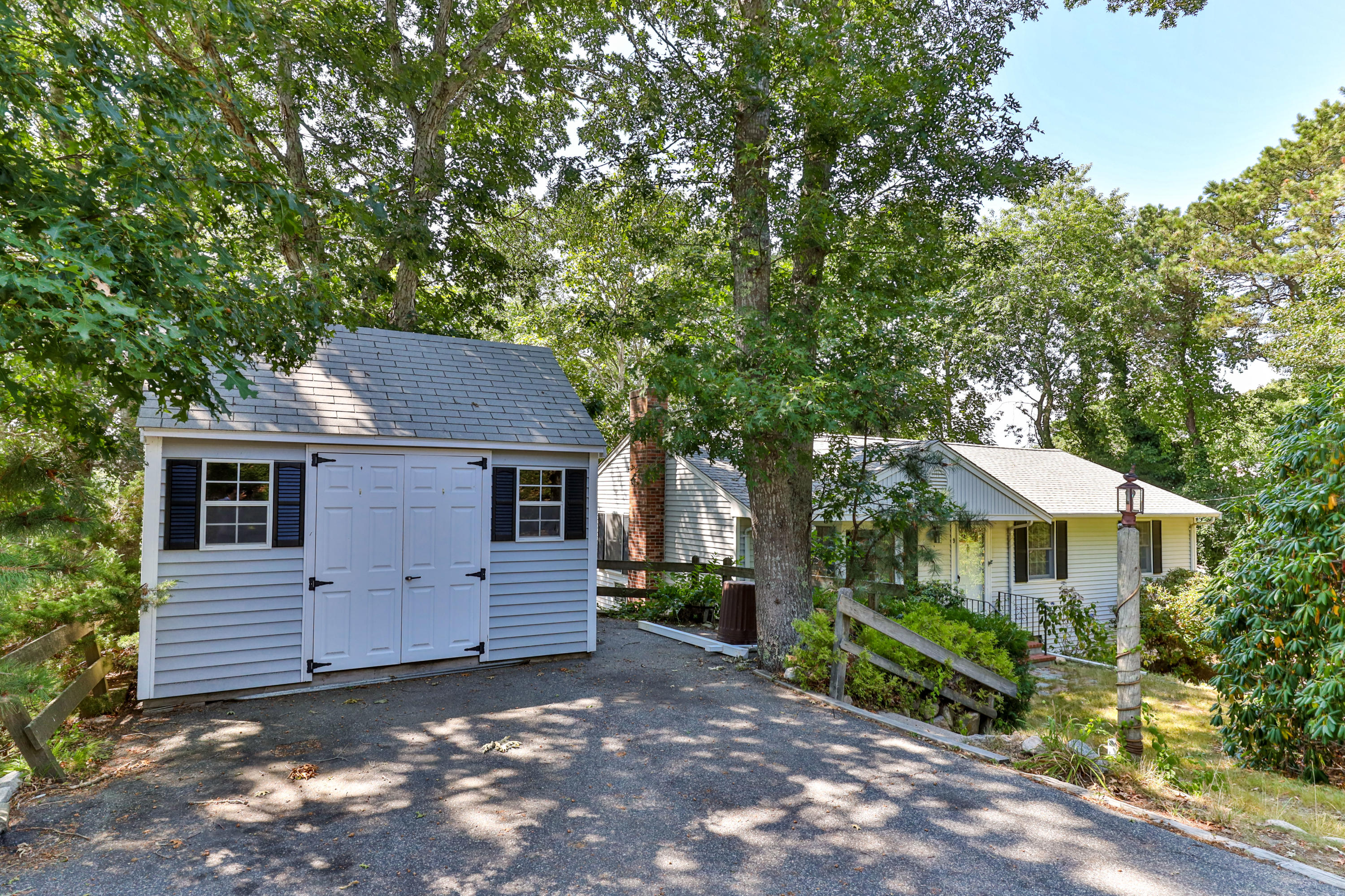 9 Green Pond Road East Falmouth, MA 02536 - Photo 44 of 46 front view of a house with a yard