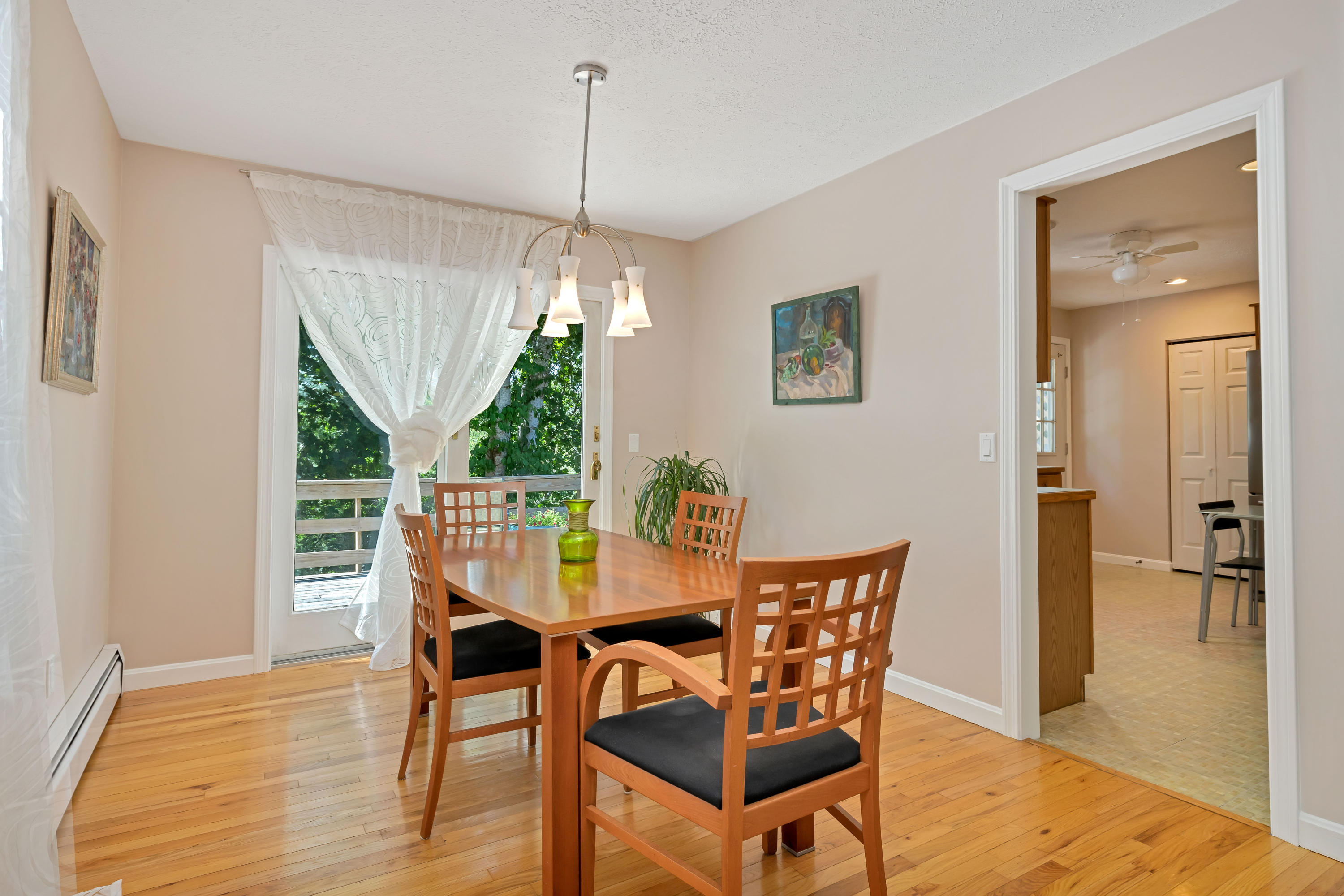 9 Green Pond Road East Falmouth, MA 02536 - Photo 8 of 46 a view of a dining room with furniture window and wooden floor