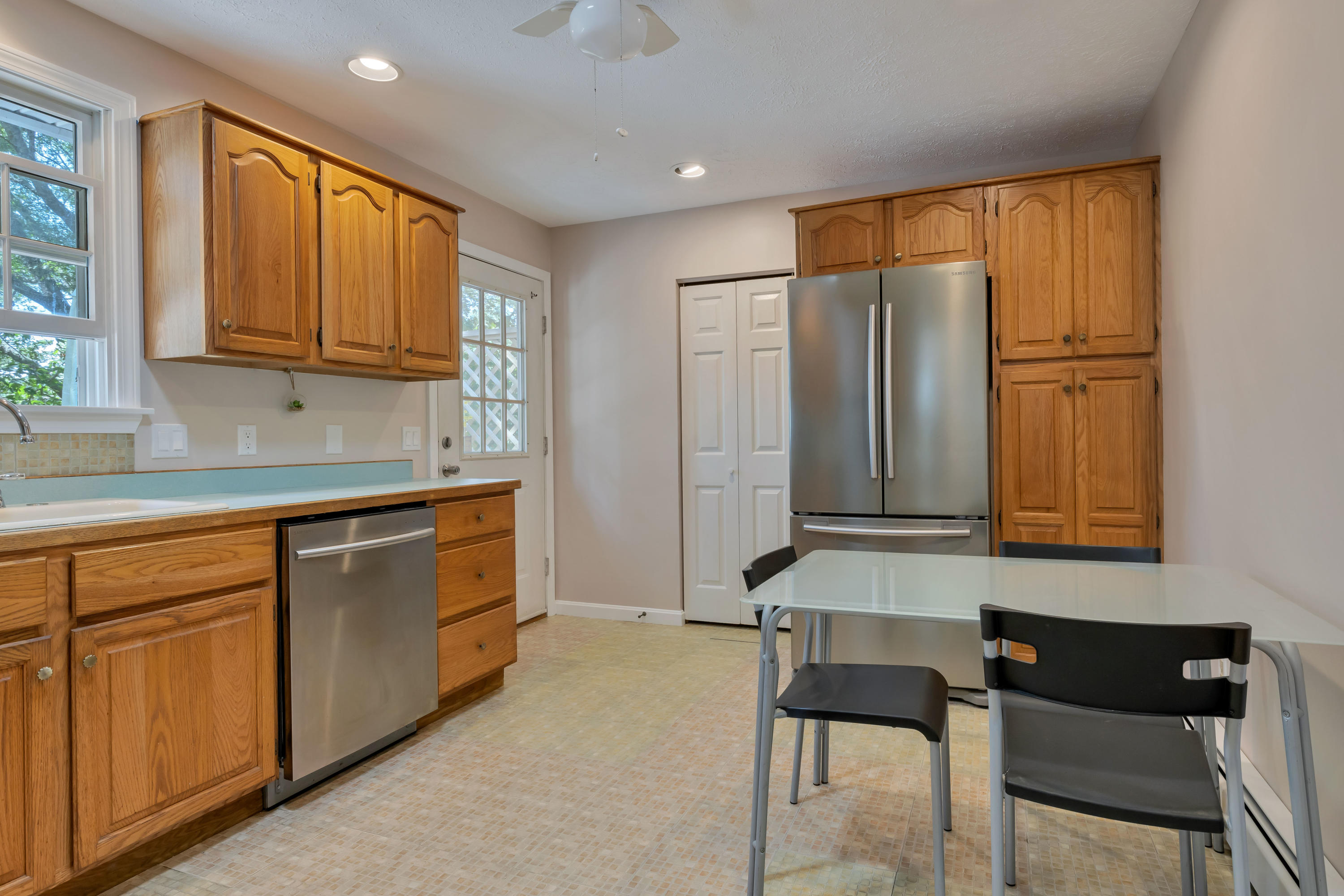 9 Green Pond Road East Falmouth, MA 02536 - Photo 9 of 46 a spacious bathroom with a granite countertop sink and a large mirror