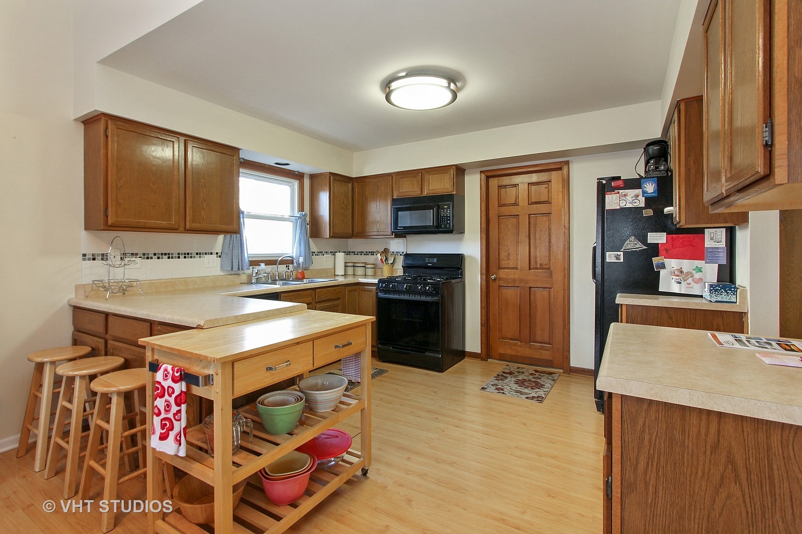 232 Foxmoor Road Fox River Grove, IL 60021 - Photo 4 of 10 a kitchen with stainless steel appliances granite countertop a sink stove and refrigerator