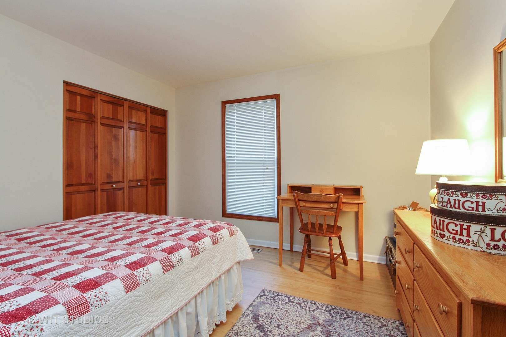 232 Foxmoor Road Fox River Grove, IL 60021 - Photo 8 of 10 a bedroom with a bed and a lamp with window