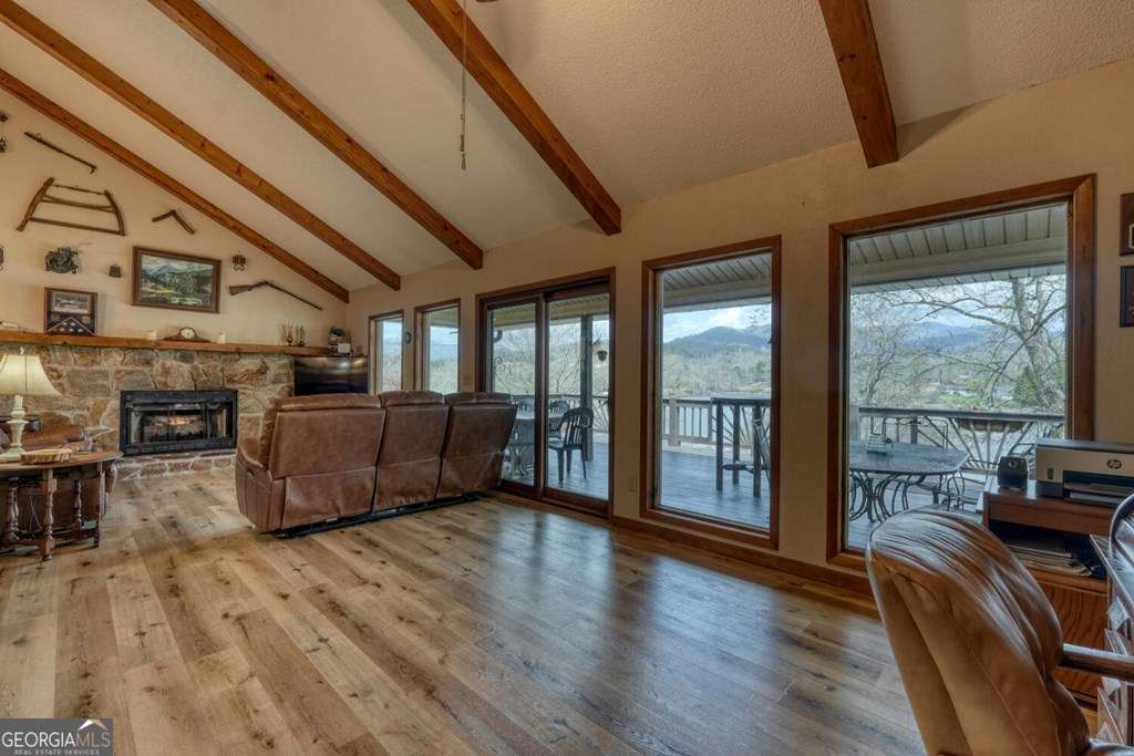 241 Kilpatrick Point Drive, Unit 8 Hayesville, NC 28904 - Photo 15 of 54 a living room with furniture and large windows
