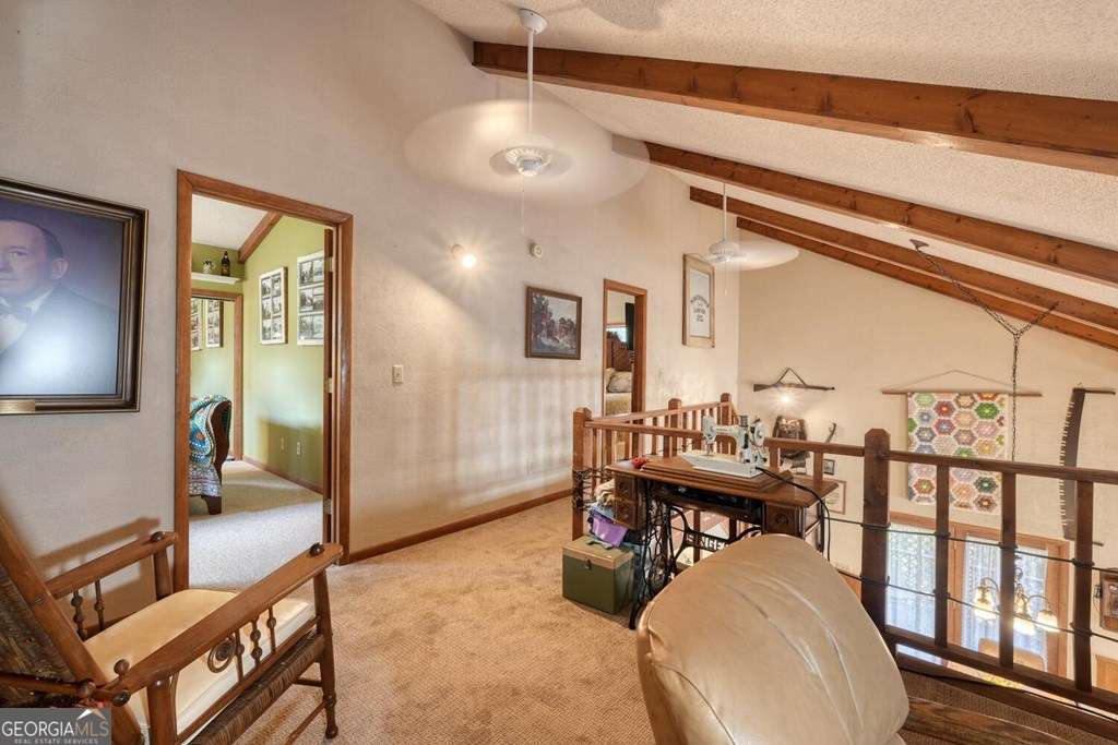 241 Kilpatrick Point Drive, Unit 8 Hayesville, NC 28904 - Photo 29 of 54 a living room with furniture