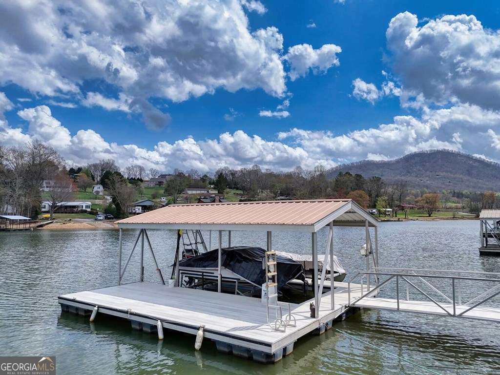 241 Kilpatrick Point Drive, Unit 8 Hayesville, NC 28904 - Photo 49 of 54 a view of house with lake swimming pool and outdoor seating