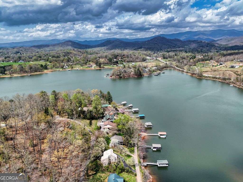 241 Kilpatrick Point Drive, Unit 8 Hayesville, NC 28904 - Photo 50 of 54 a view of a lake with a city