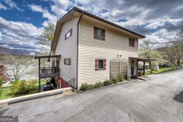 a front view of a house with a garage