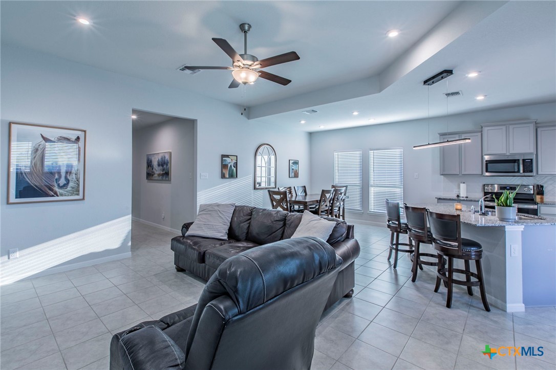 908 Coriander Road Temple, TX 76501 - Photo 3 of 28 a living room with furniture and kitchen view