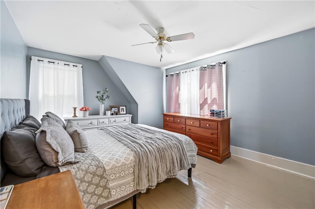 1034 Myrtle Place Sharon, PA 16146 - Photo 14 of 31 a bedroom with a bed and window