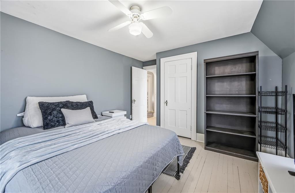 1034 Myrtle Place Sharon, PA 16146 - Photo 15 of 31 a bedroom with a bed and a chandelier