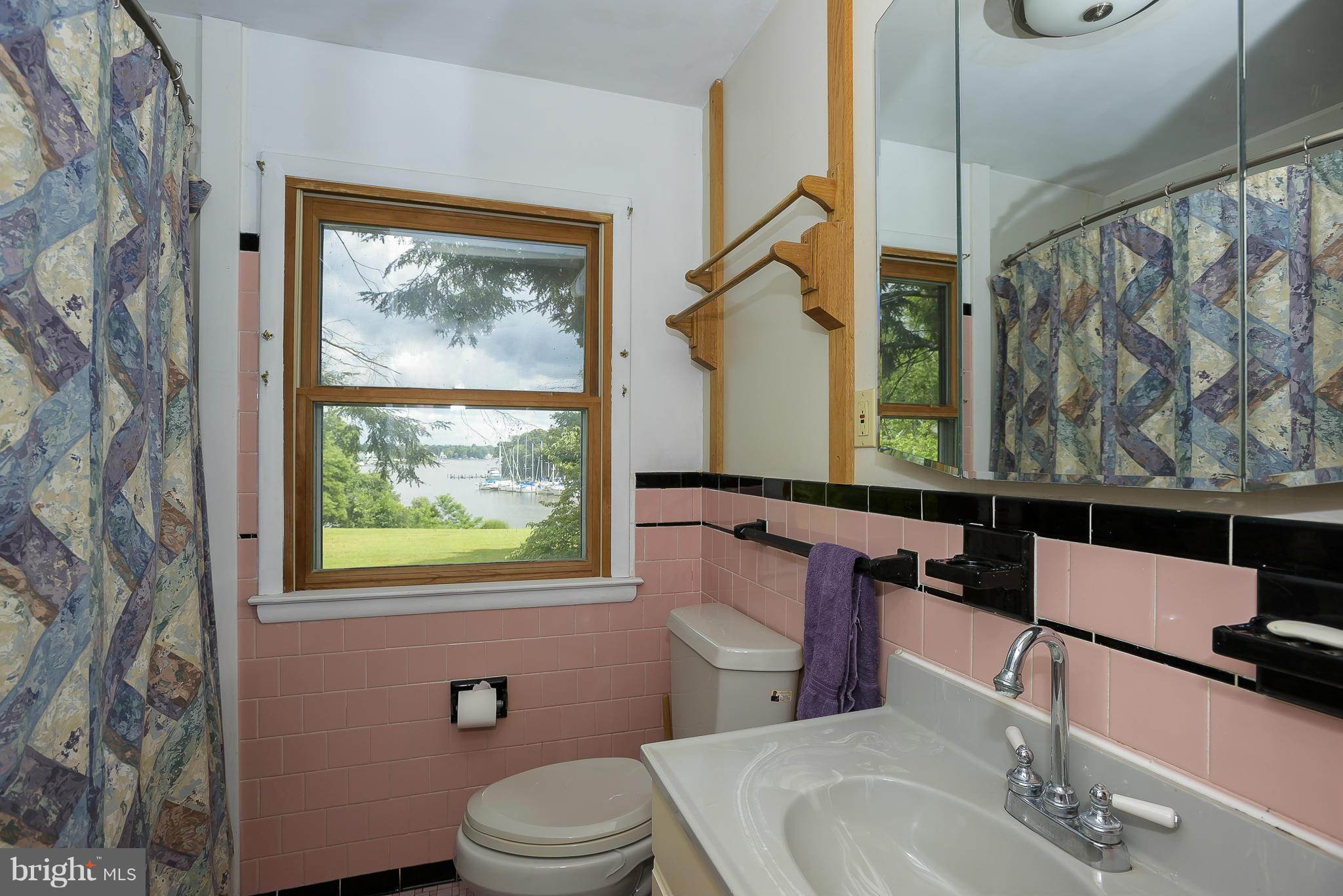 1322 River Road Pasadena, MD 21122 - Photo 13 of 25 Bathroom has wonderful water views.