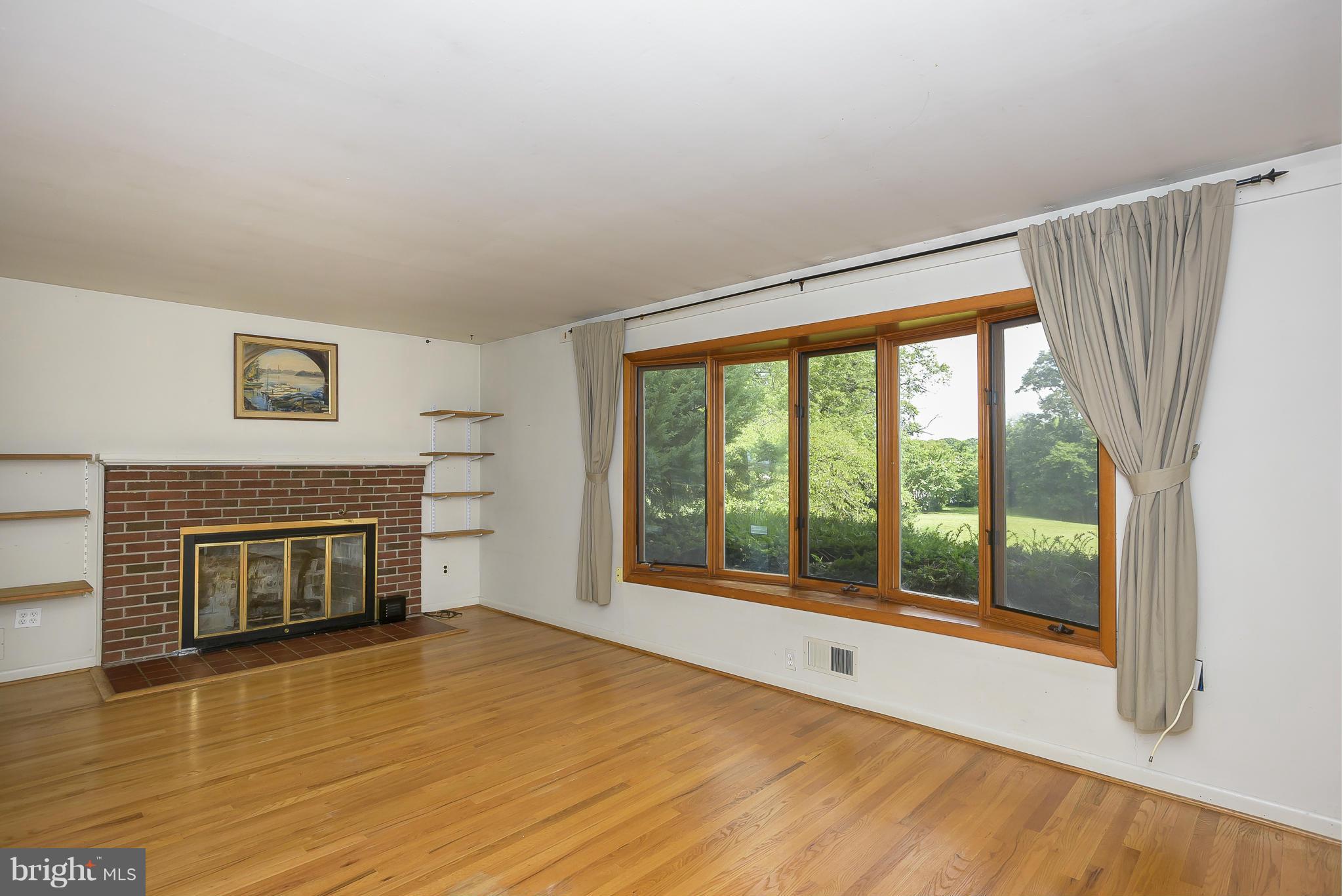 Living Room has a fireplace.