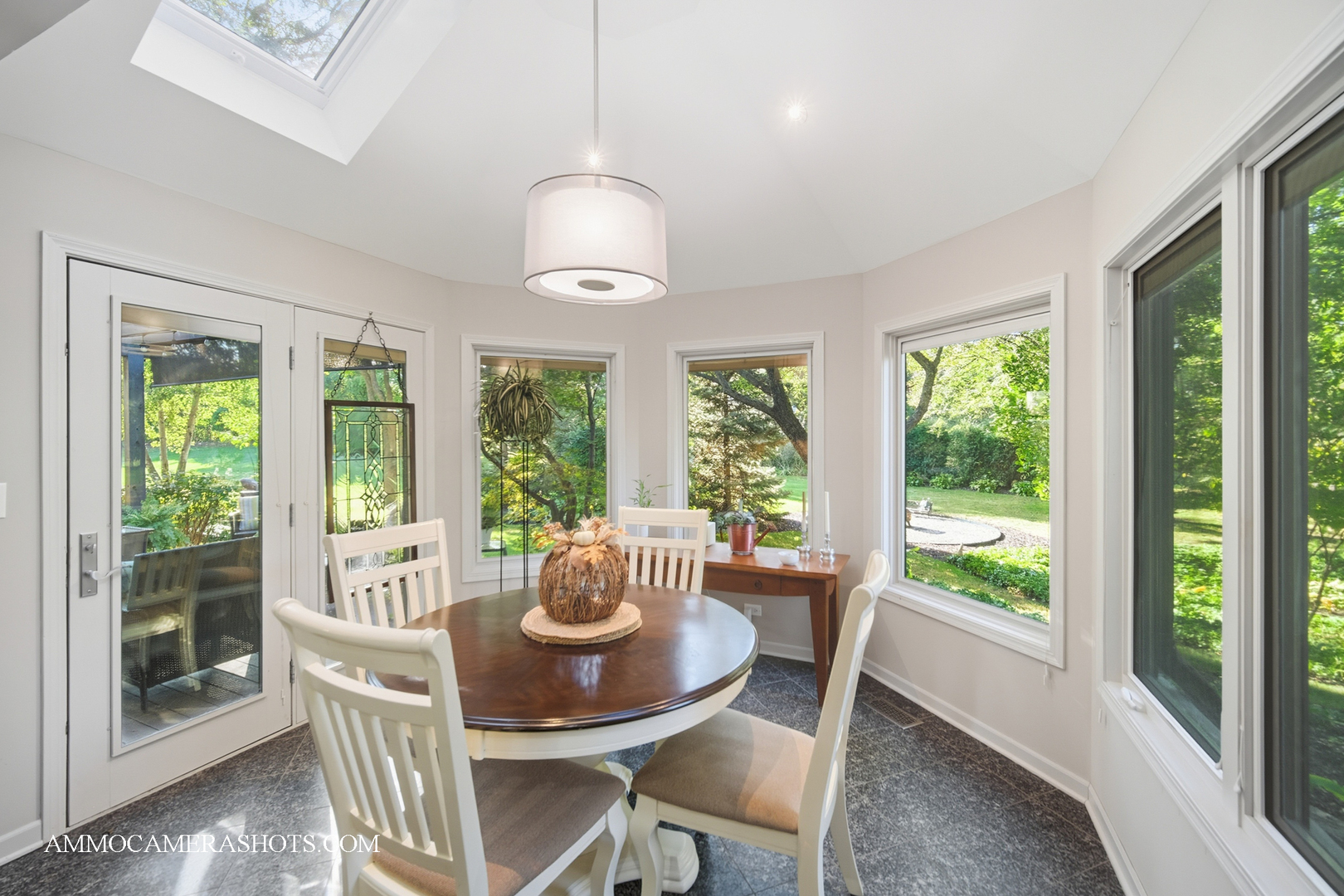 12 Highgate Court St. Charles, IL 60174 - Photo 17 of 60 a view of a dining room with furniture window and outside view