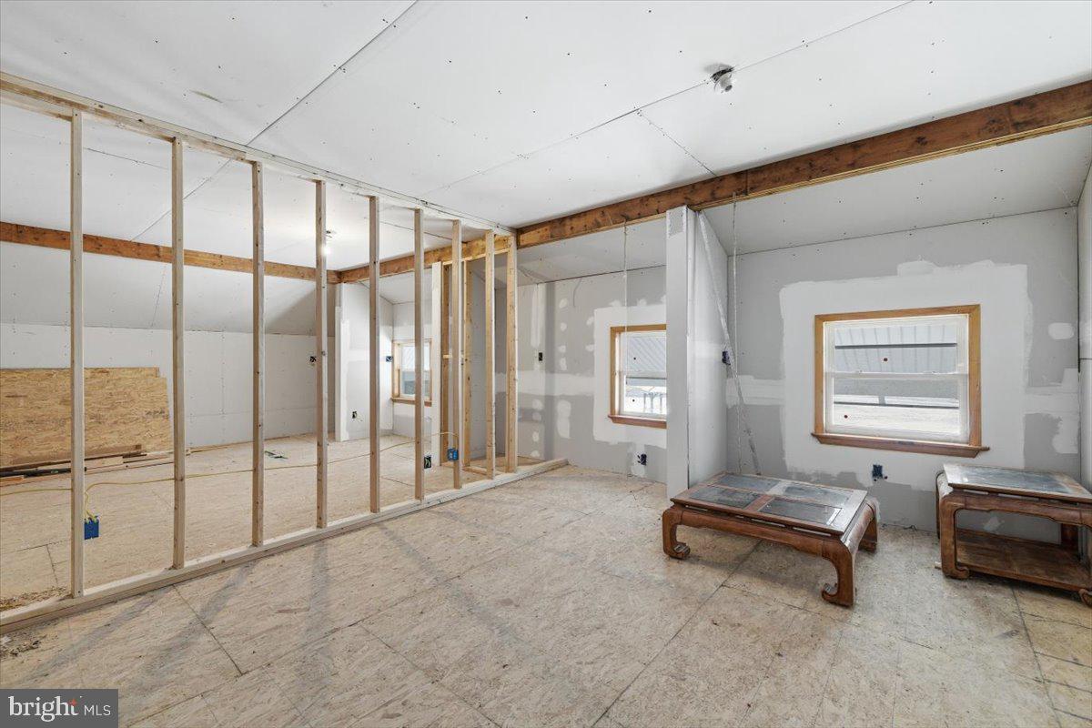 159 Colony Villiage Cresco, PA 18326 - Photo 32 of 105 a living room with furniture a window and a glass door