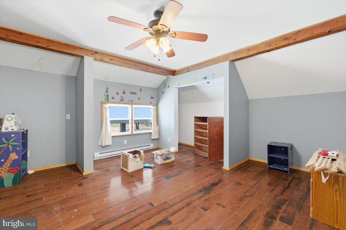 159 Colony Villiage Cresco, PA 18326 - Photo 33 of 105 a view of a livingroom with hardwood floor and a ceiling fan