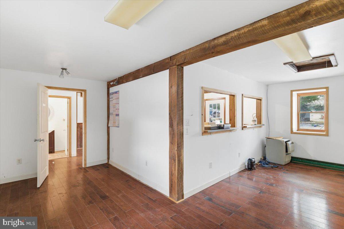 159 Colony Villiage Cresco, PA 18326 - Photo 44 of 105 a view of livingroom with hardwood floor and hallway
