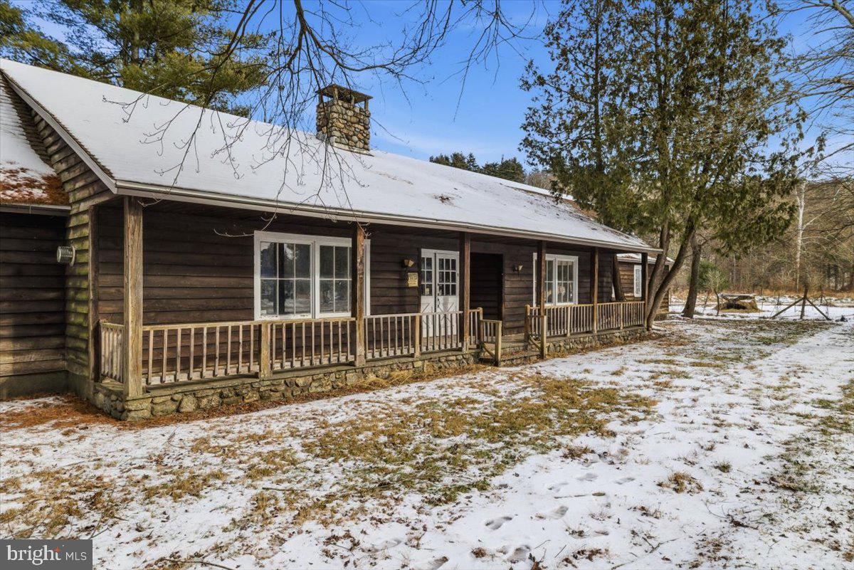159 Colony Villiage Cresco, PA 18326 - Photo 48 of 105 a front view of a house with a garden