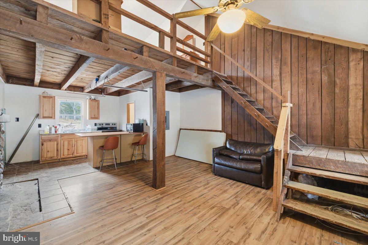 159 Colony Villiage Cresco, PA 18326 - Photo 60 of 105 a view of kitchen with furniture and wooden floor