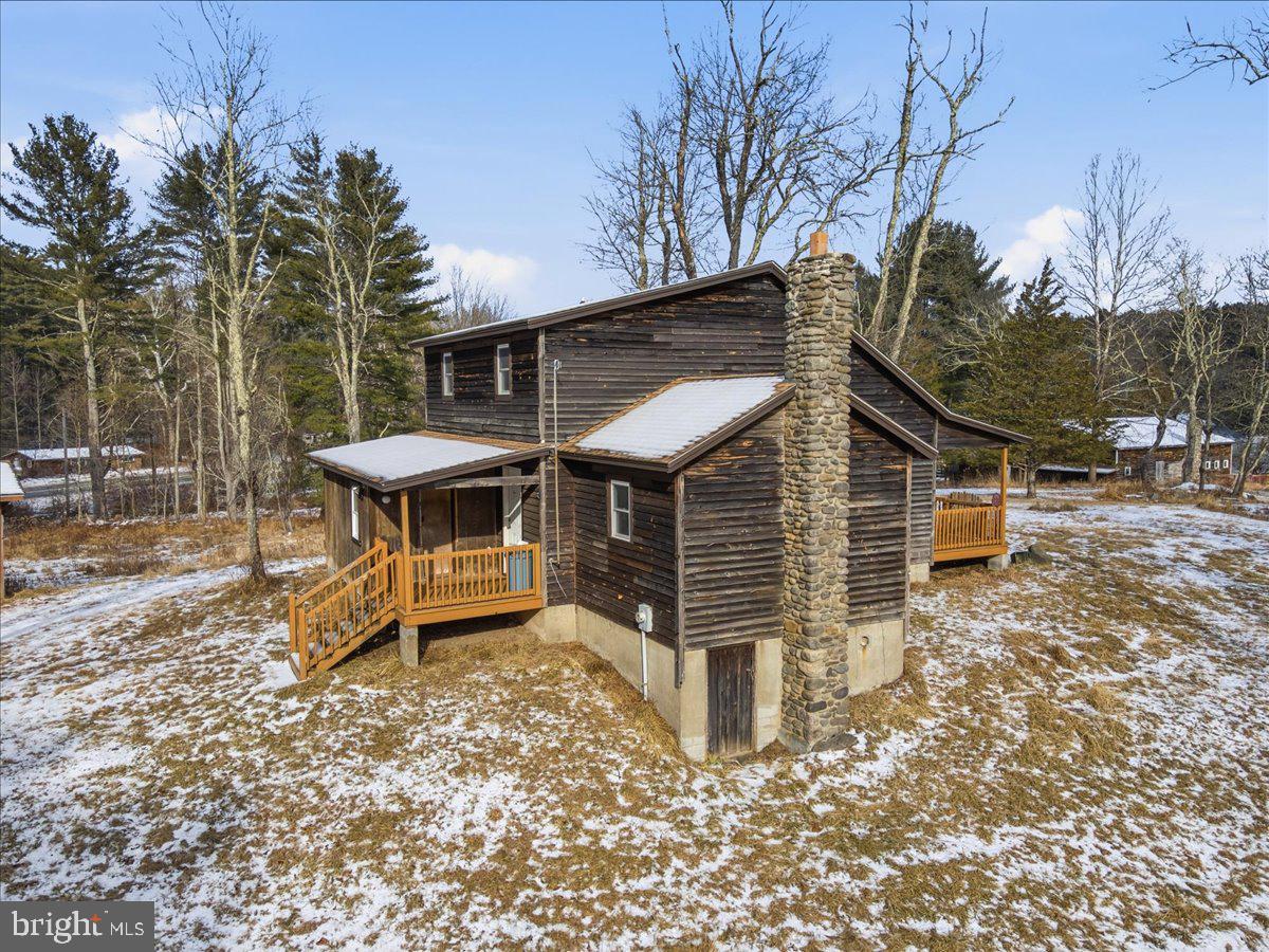159 Colony Villiage Cresco, PA 18326 - Photo 73 of 105 a front view of a house with a yard