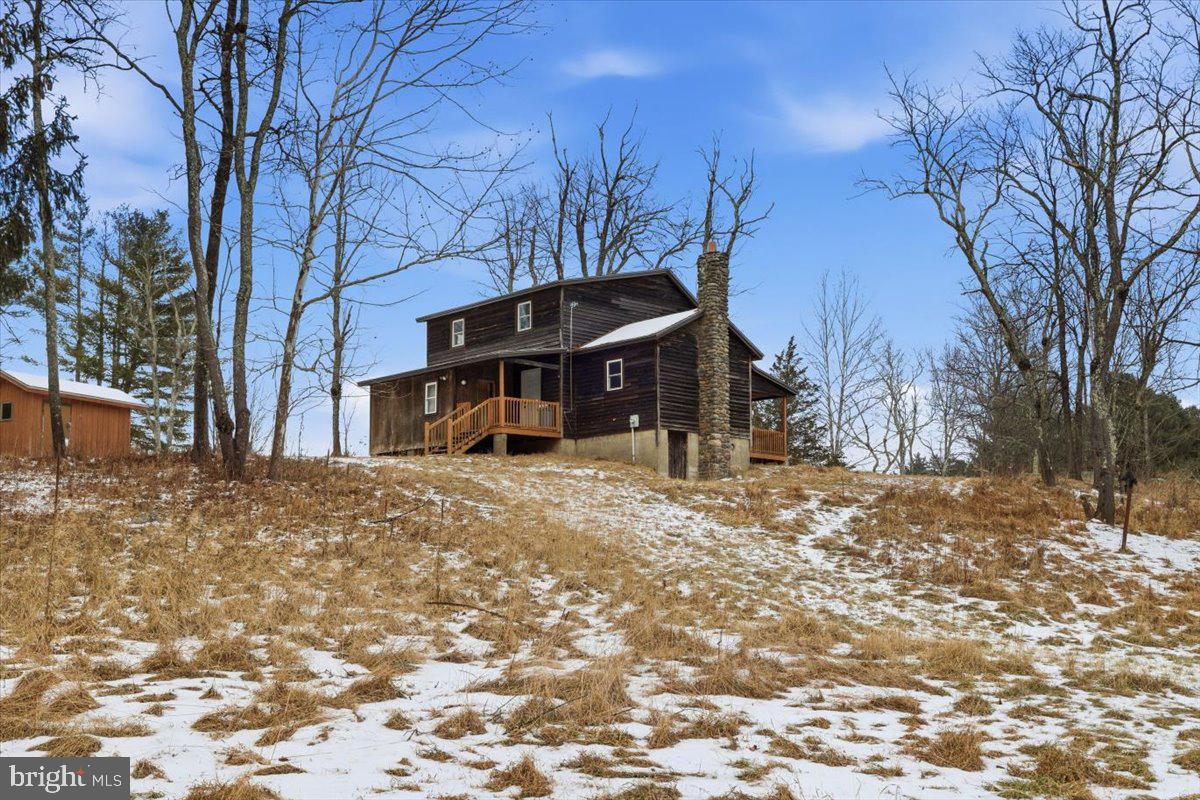 159 Colony Villiage Cresco, PA 18326 - Photo 75 of 105 a view of a house with a yard covered in snow