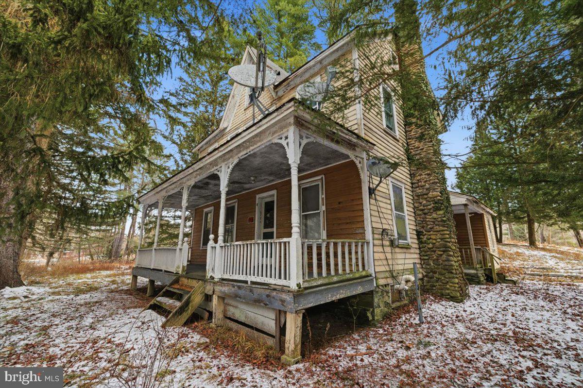 159 Colony Villiage Cresco, PA 18326 - Photo 80 of 105 a view of a small house with a yard and wooden fence
