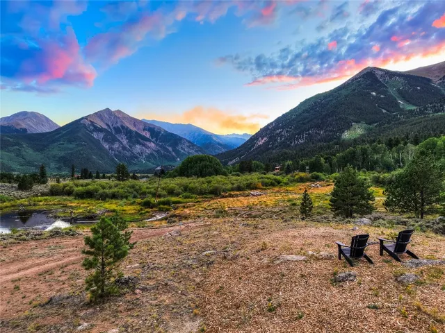 a view of a lake with mountains in the background