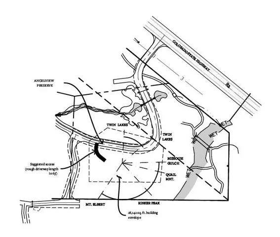 a view of a swimming pool with a table and chairs