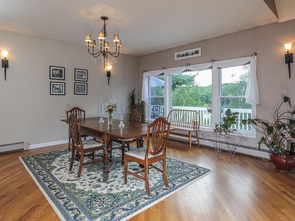 107 Wallentine Road Bowdoinham, ME 04008 - Photo 8 of 35 The dining area shares access to the...