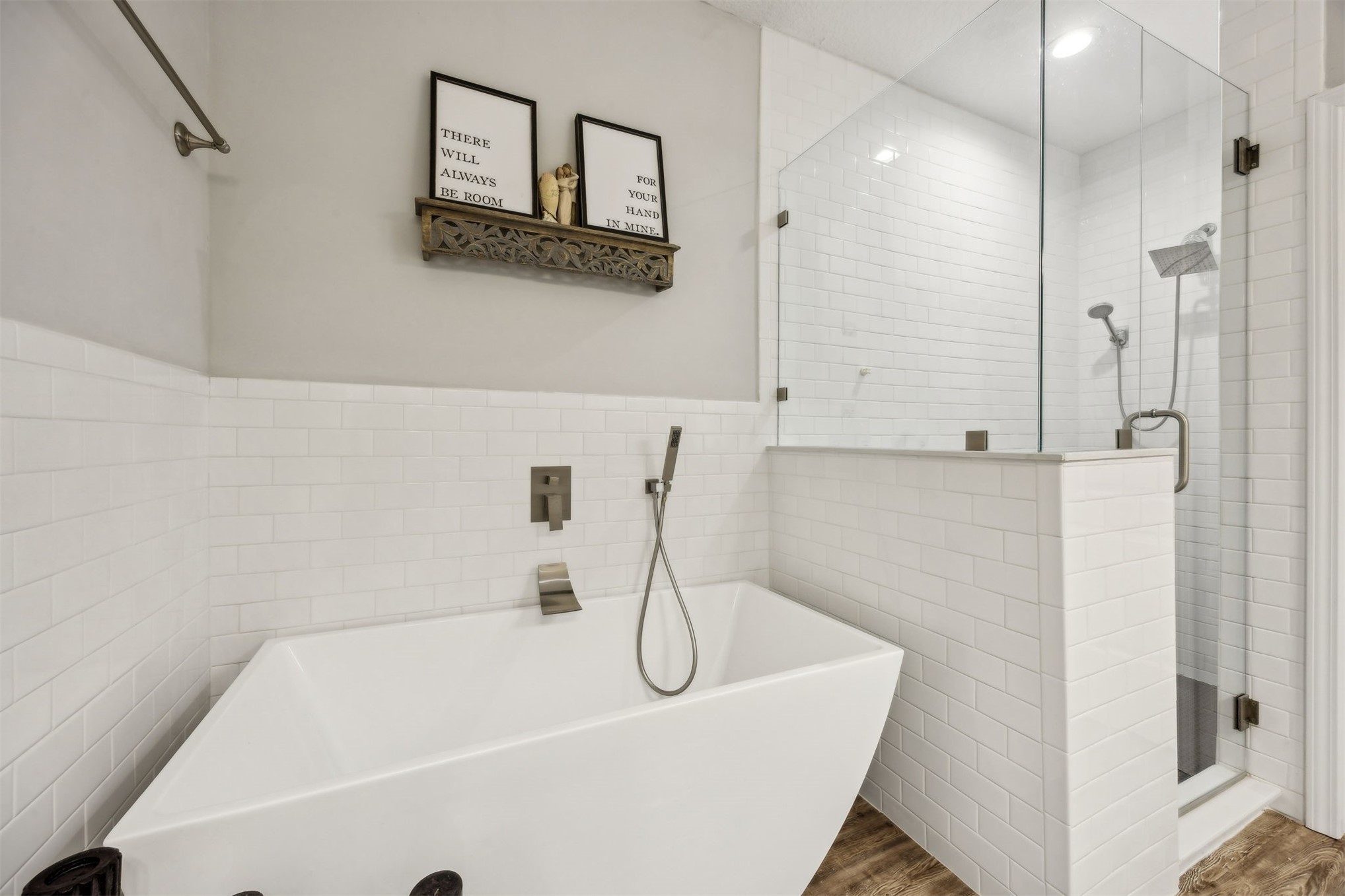 96718 Blackrock Road Yulee, FL 32097 - Photo 6 of 54 a bathroom with a white bath tub sitting next to shower