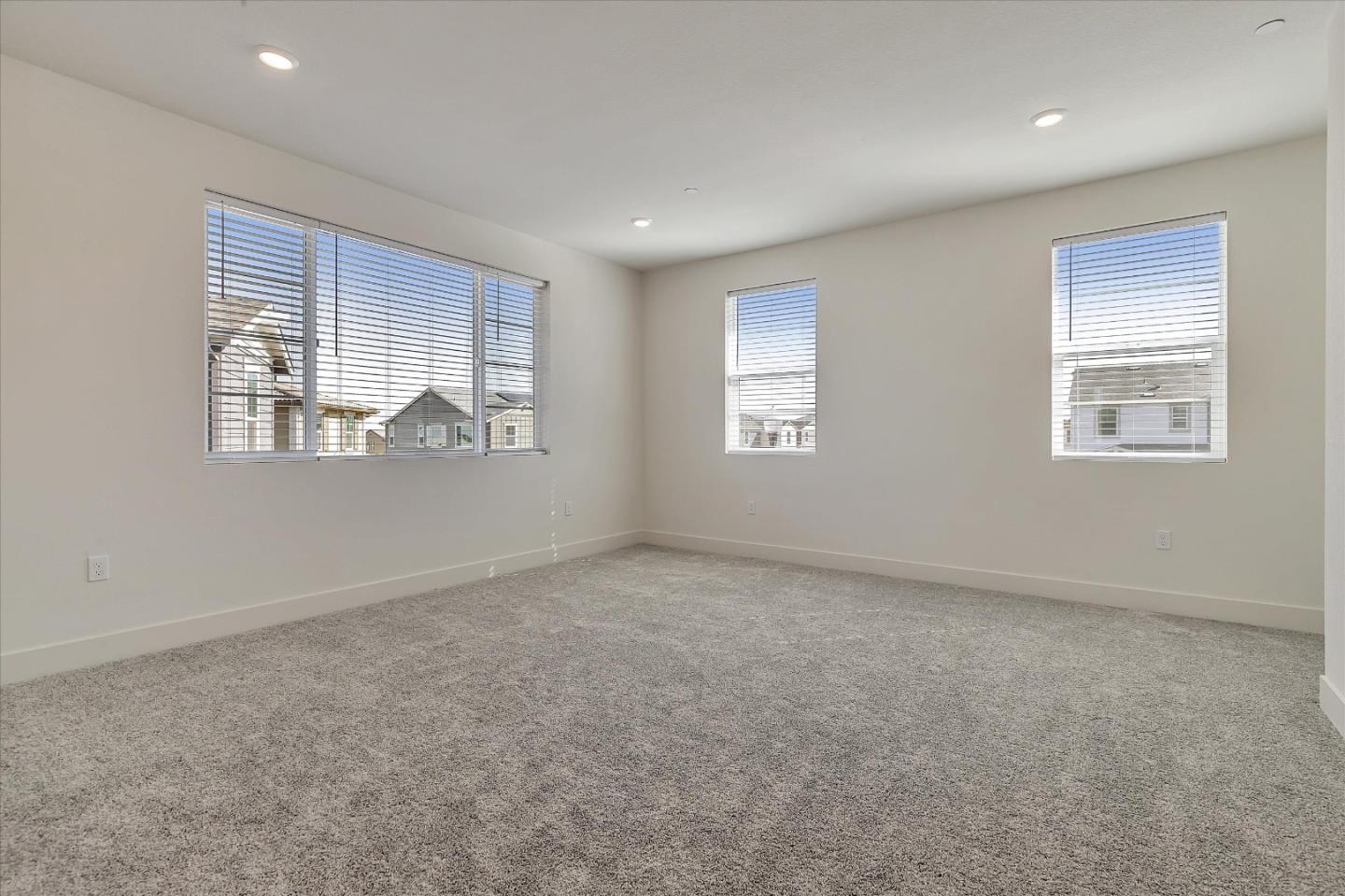 5459 Posner Avenue Tracy, CA 95377 - Photo 14 of 29 an empty room with windows