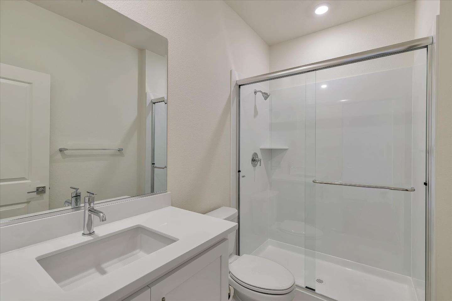 5459 Posner Avenue Tracy, CA 95377 - Photo 20 of 29 a bathroom with a sink toilet and shower