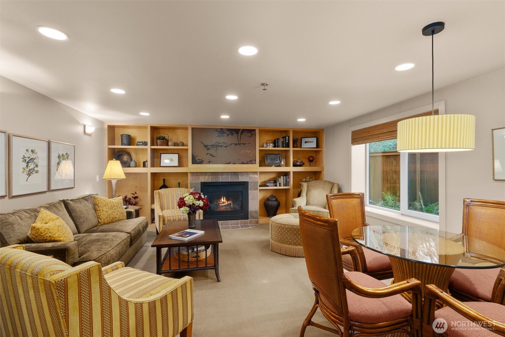 1005 Harbor Avenue Southwest, Unit 400 Seattle, WA 98116 - Photo 37 of 39 a living room with furniture and a fireplace