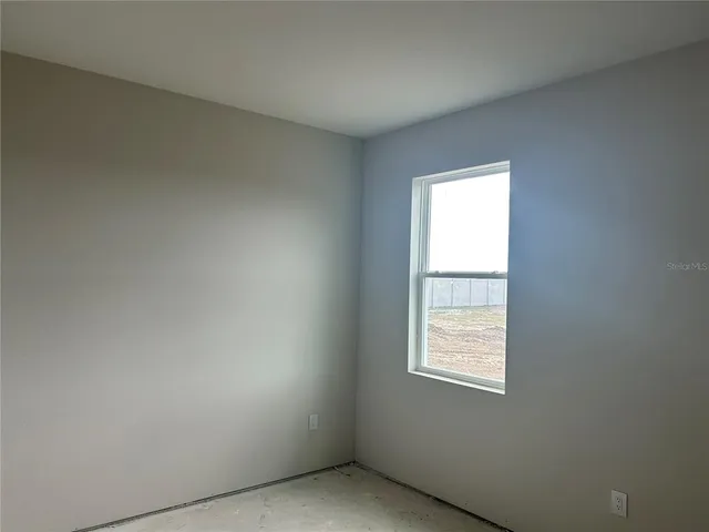 an empty room with a window