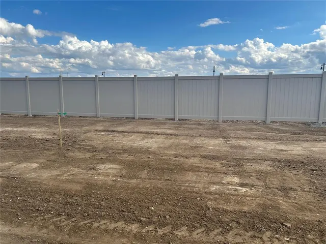 a view of wooden floor and cabinet