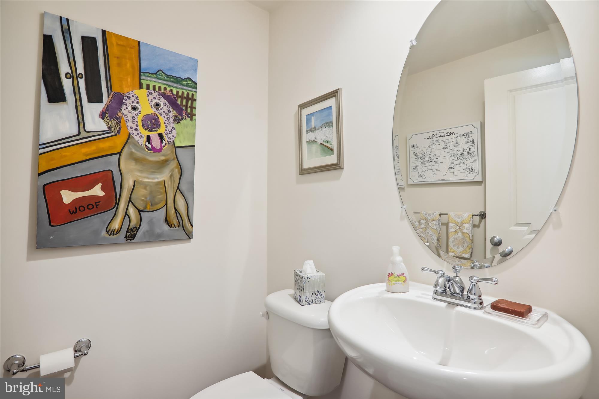 1609 Poplar Run Drive Silver Spring, MD 20906 - Photo 12 of 71 a bathroom with a sink and mirror with toilet