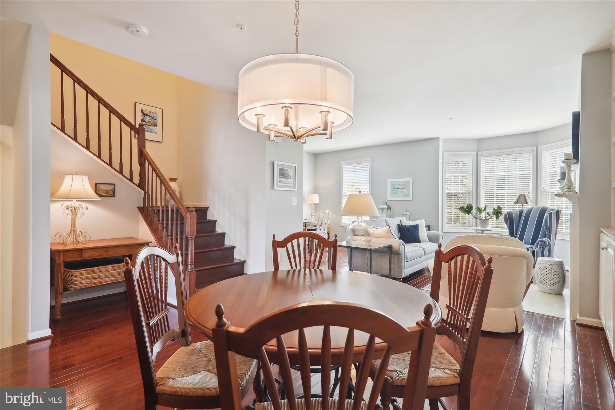 1609 Poplar Run Drive Silver Spring, MD 20906 - Photo 14 of 71 a dining room with furniture a chandelier and wooden floor