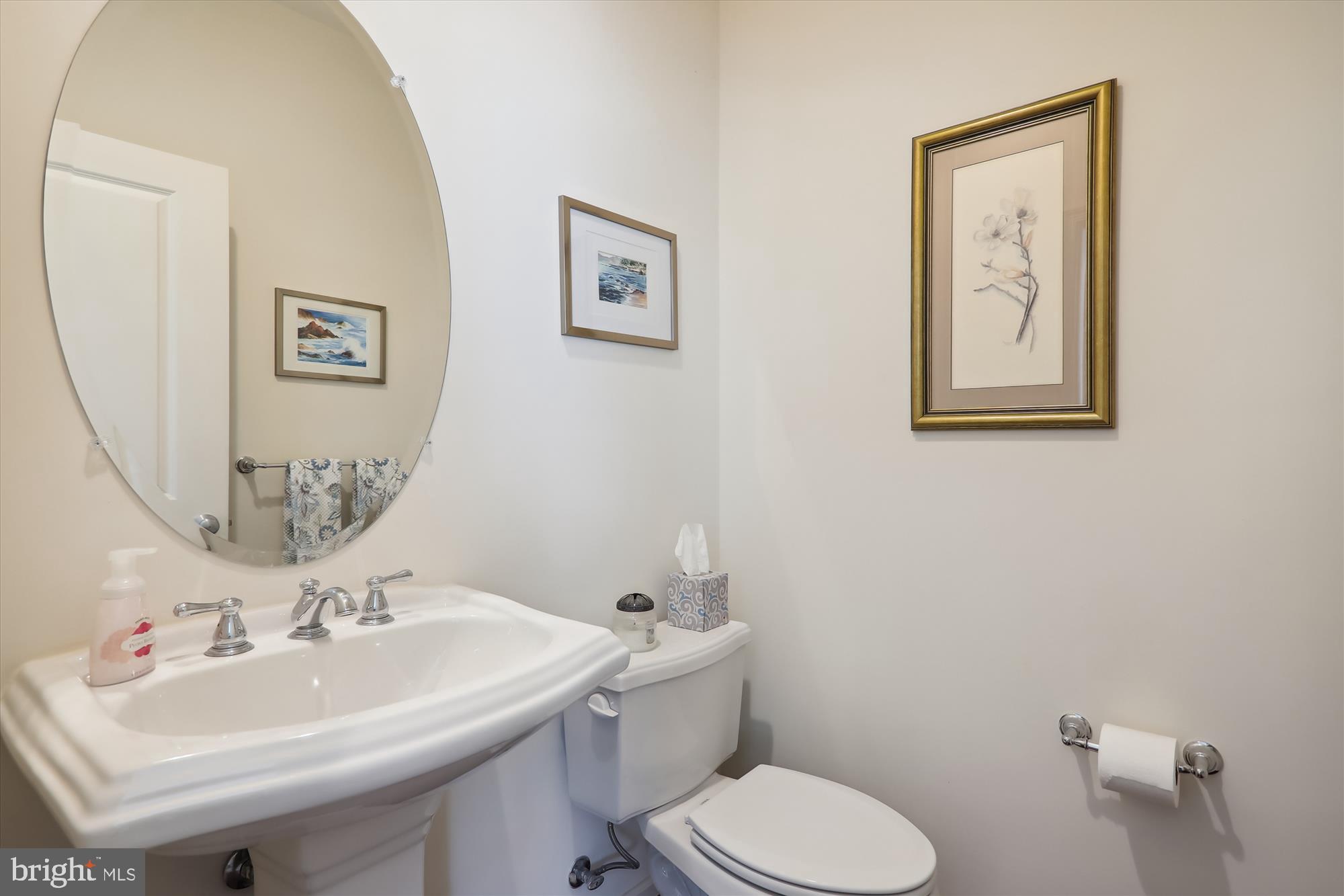 1609 Poplar Run Drive Silver Spring, MD 20906 - Photo 32 of 71 a bathroom with a toilet sink and mirror