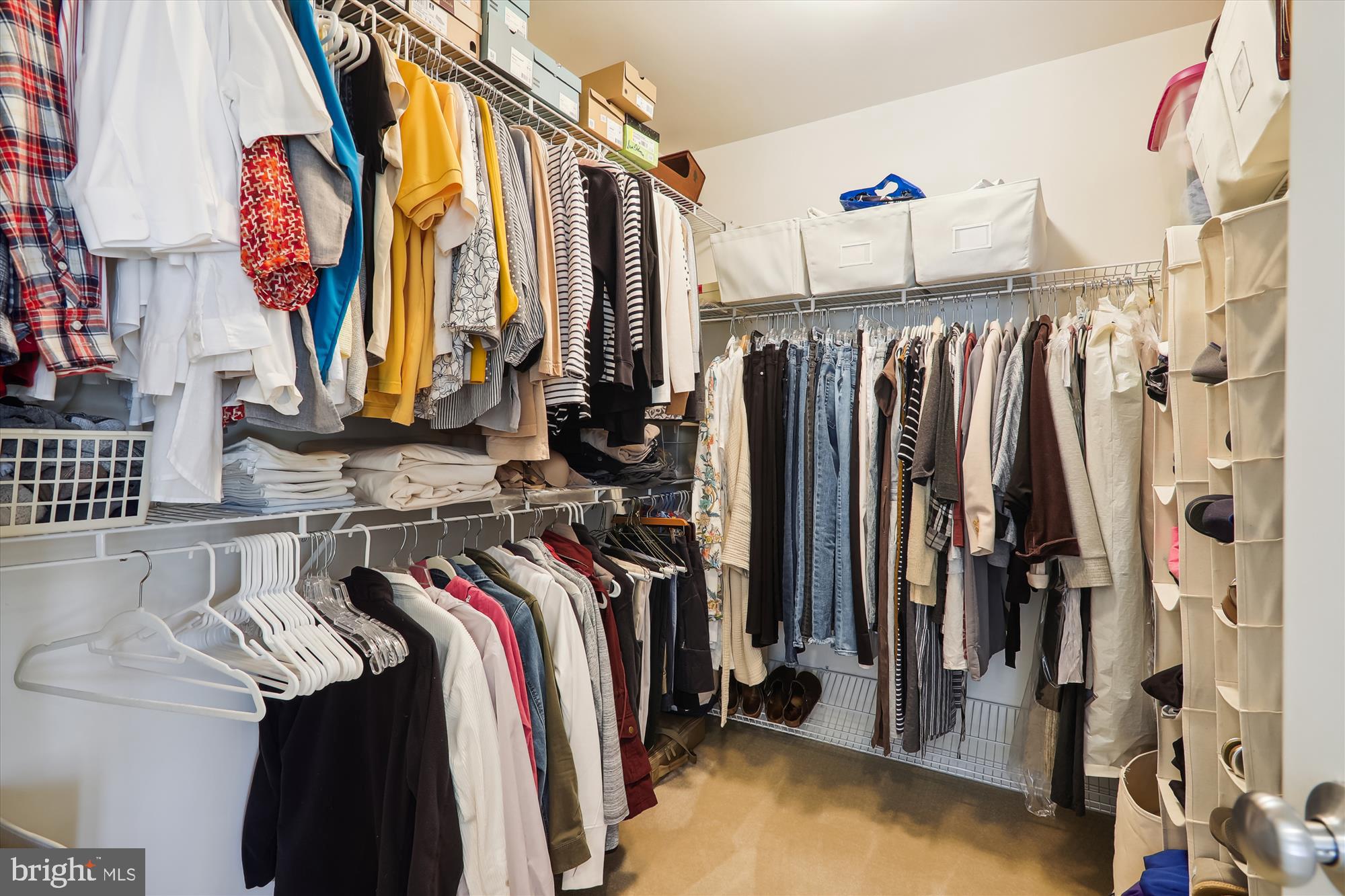 1609 Poplar Run Drive Silver Spring, MD 20906 - Photo 42 of 71 a view of walk in closet with clothes and shoes