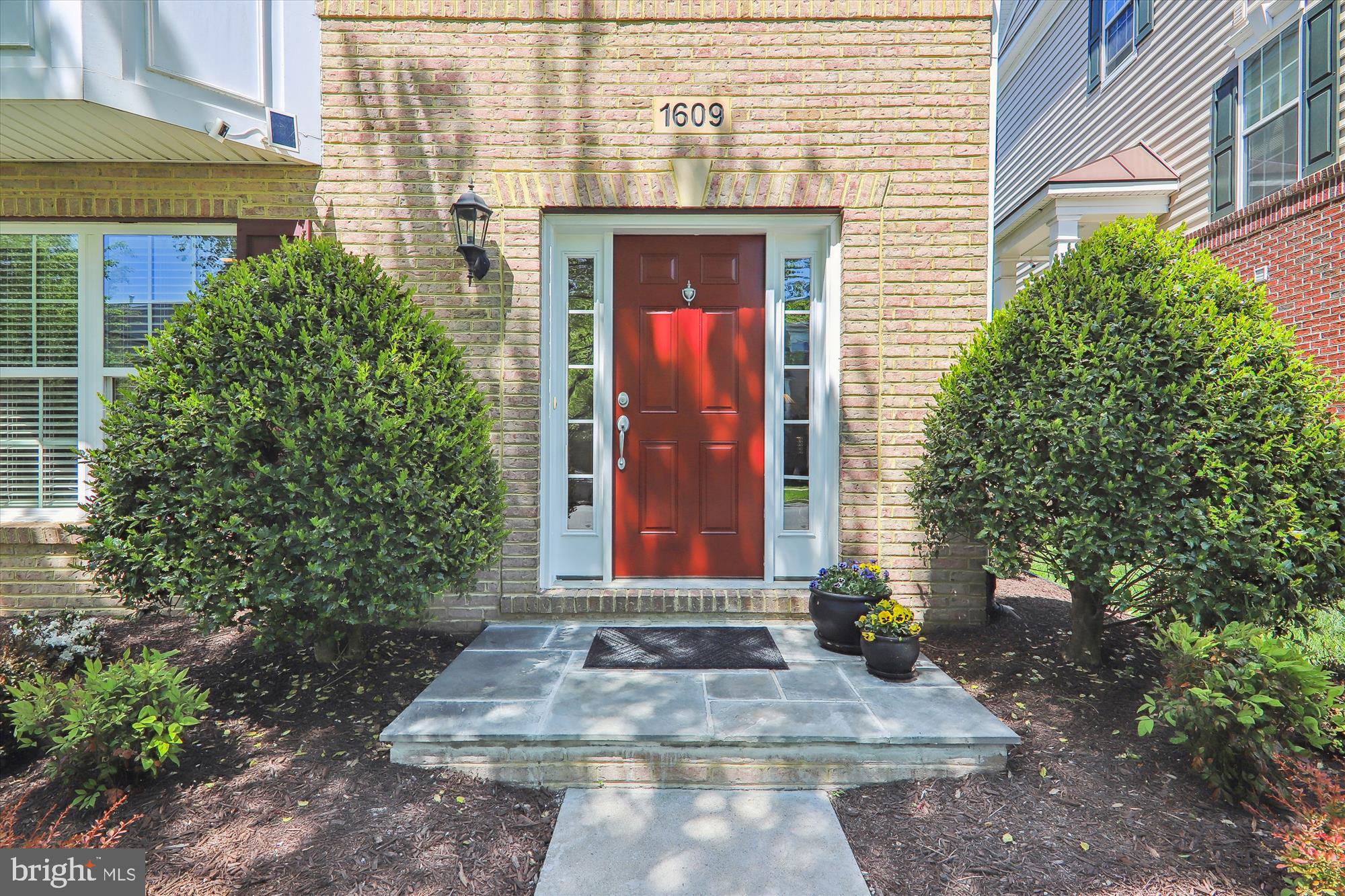 1609 Poplar Run Drive Silver Spring, MD 20906 - Photo 5 of 71 a front view of a house with garden