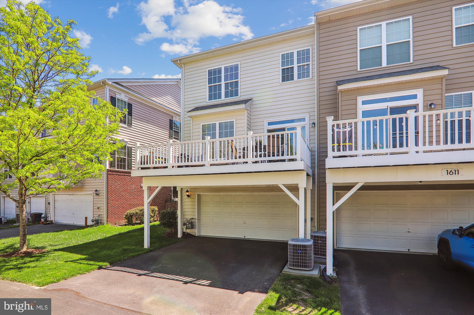 1609 Poplar Run Drive Silver Spring, MD 20906 - Photo 55 of 71 a front view of a house with a yard