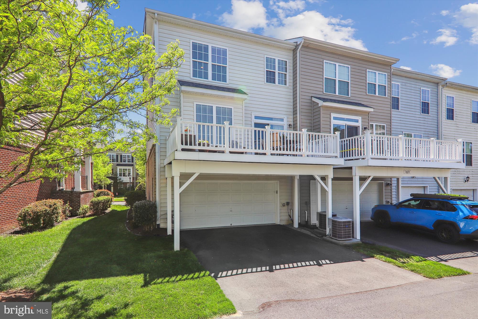 1609 Poplar Run Drive Silver Spring, MD 20906 - Photo 58 of 71 a front view of a building with a garden